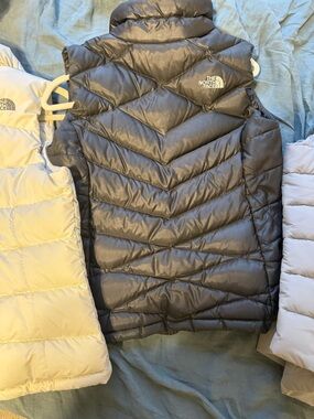 The North Face Puffer Vest Cream, Gray, & Black selling together